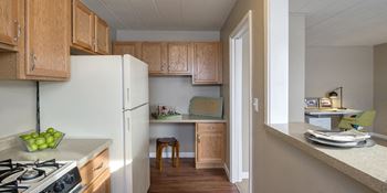 Oak or white cabinetry in select homes